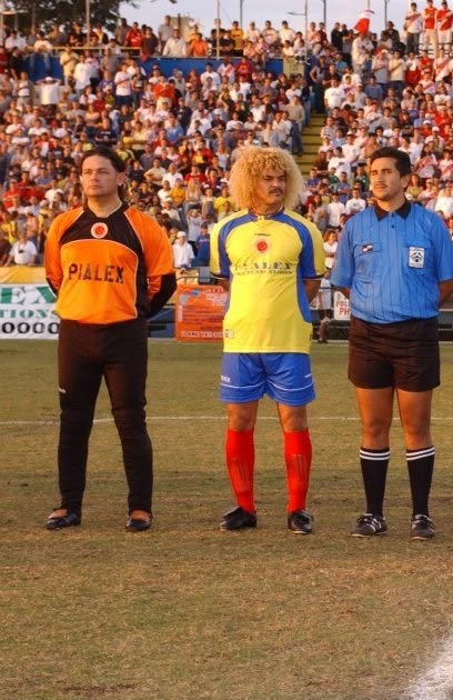 On the pitch as a referee for Colombia vs Peru, alongside Colombian legend Carlos 'El Pibe' Valderrama.